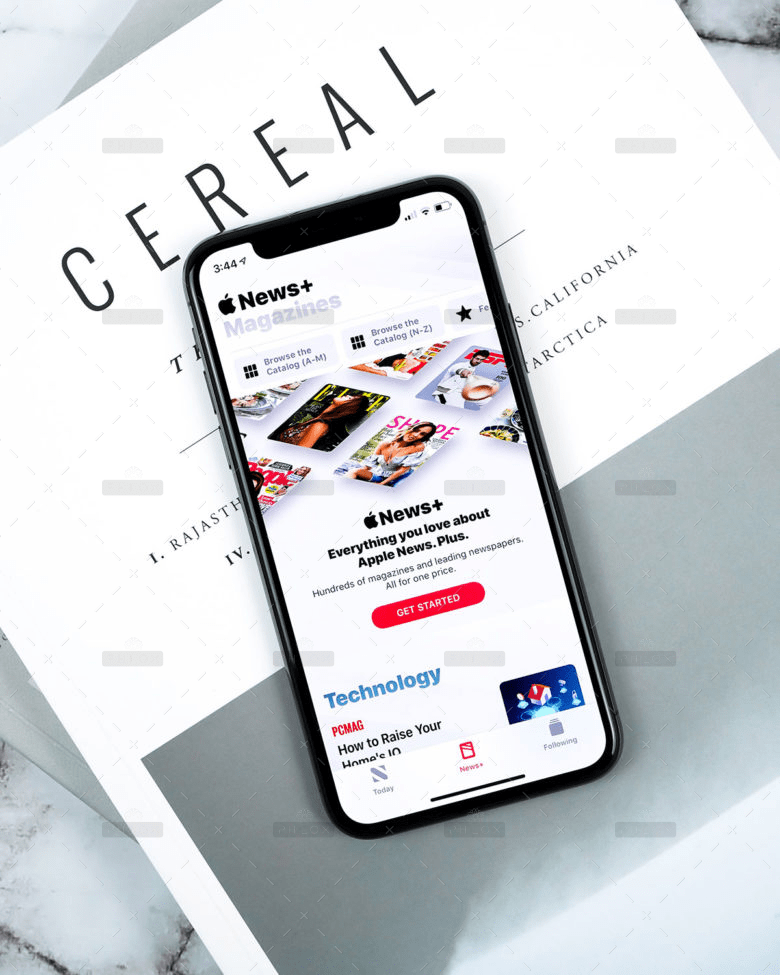 Smartphone mit News-App für Ferienhaus-Verwaltung, Magazin-Abo.
